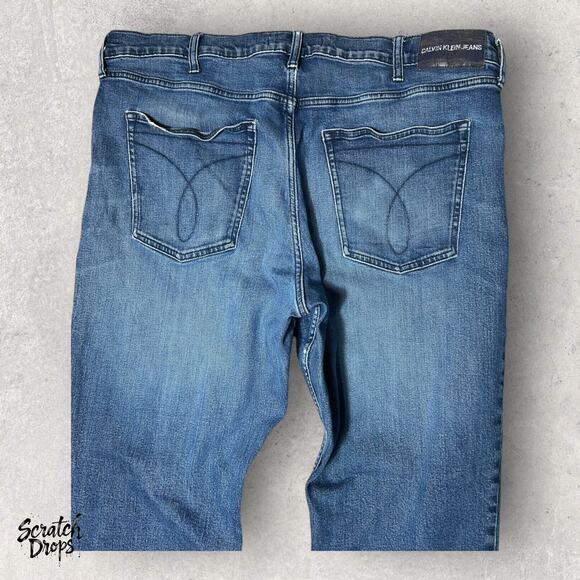 Calvin Klein Jeans Mens Distressed Blue Denim Straight Leg Vintage Fit Pants - Picture 2 of 7